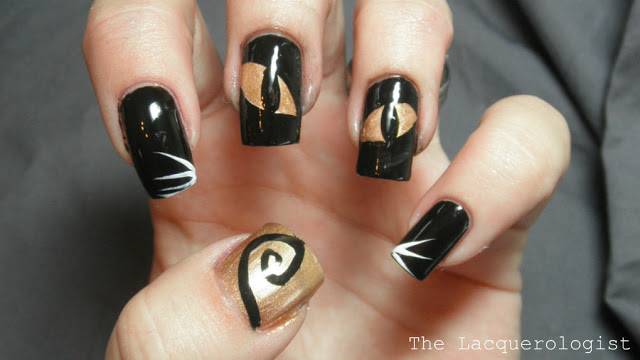 40+ Spooky and Creative DIY Halloween Nail Art Ideas --> Black Cat Nail Art